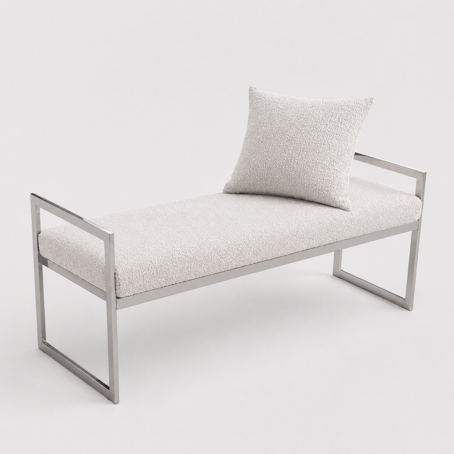 Modern bench with metal frame and textured cushion on a white background