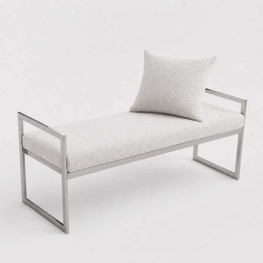 Modern bench with metal frame and textured cushion on a white background