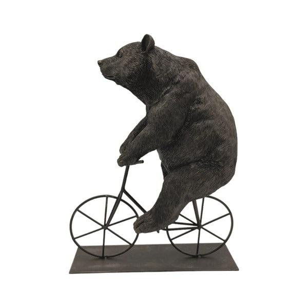 Quirky 27.5cm figurine of a bear riding a bicycle, styled on a white background.