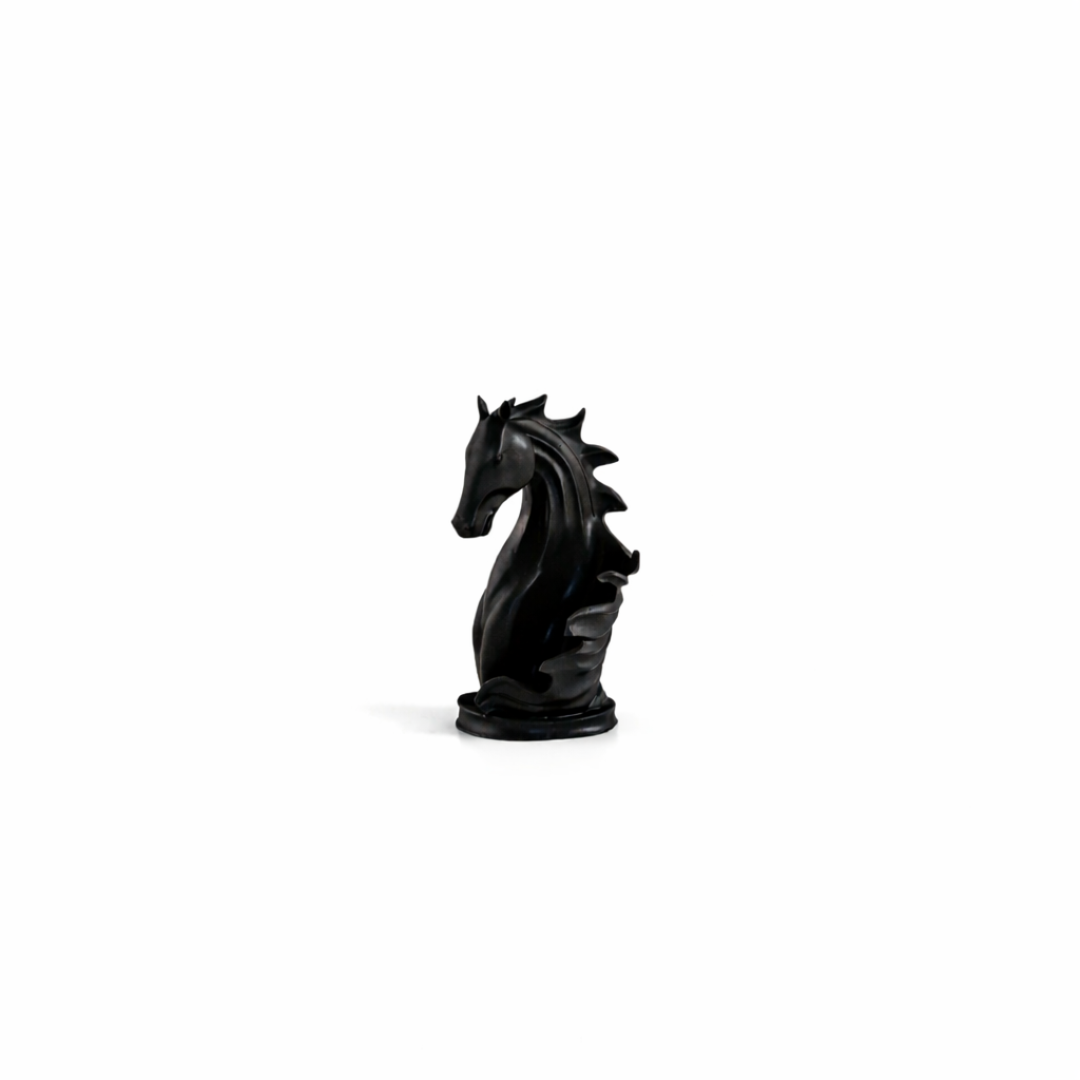 Sculptural matte black horse wine bottle holder cradling a bottle on a modern wooden bar top.