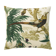 Decorative pillow with bird and leaf pattern on a white background