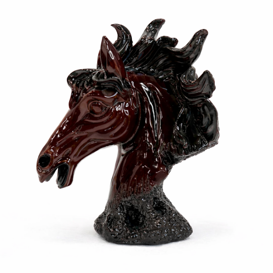Dark plum glossy horse head sculpture with a flowing mane displayed on a white background.