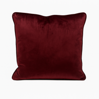 Mulberry velvet cushion on a white background