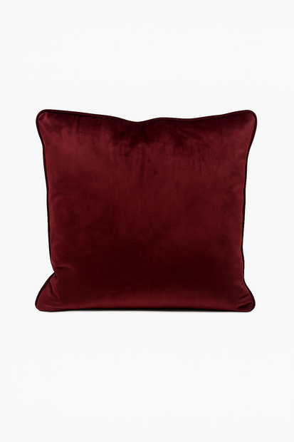 Mulberry velvet cushion on a white background