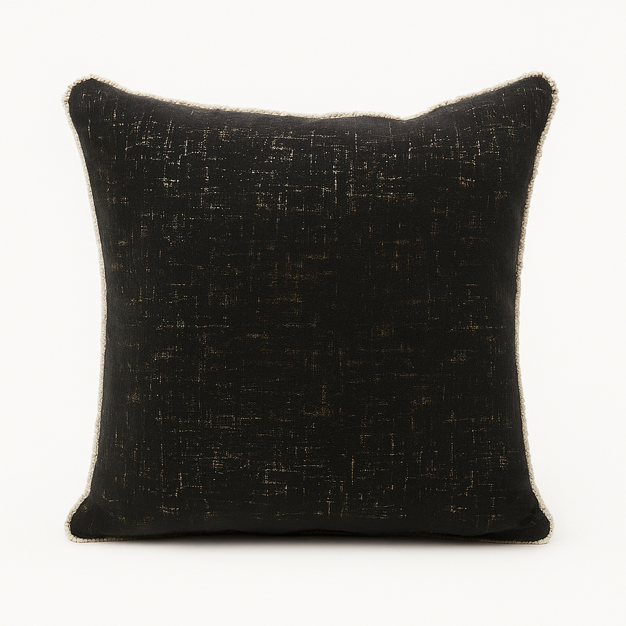 Black textured cushion on a white background