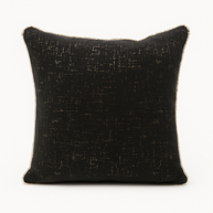 Black textured cushion on a white background