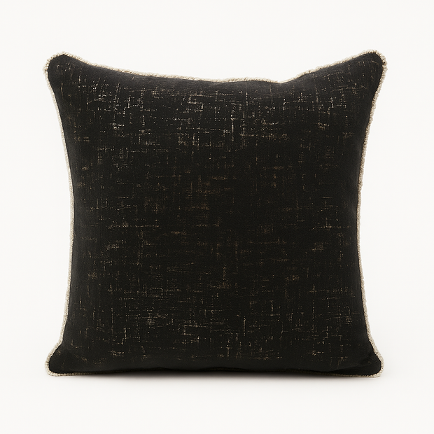 Black textured cushion on a white background