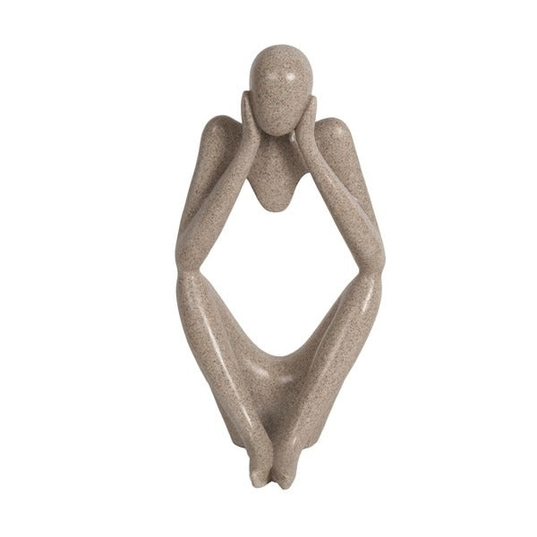 22cm stone-wash yoga figure with an abstract cut-out body design, styled on a wooden shelf next to an incense burner.