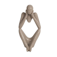 22cm stone-wash yoga figure with an abstract cut-out body design, styled on a wooden shelf next to an incense burner.