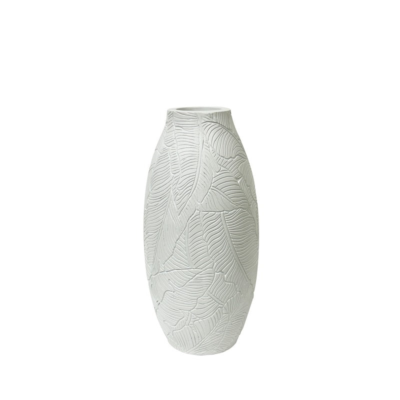 White leaves polyresin vase on a white background