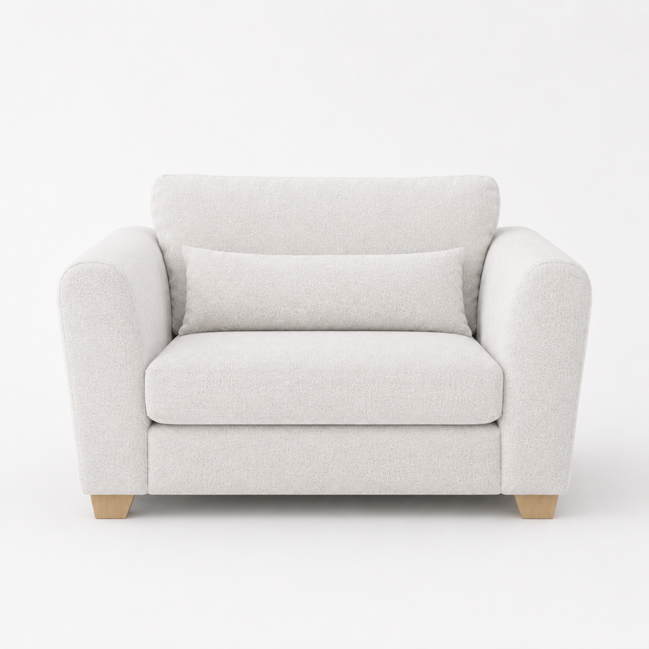 Light gray armchair on a white background