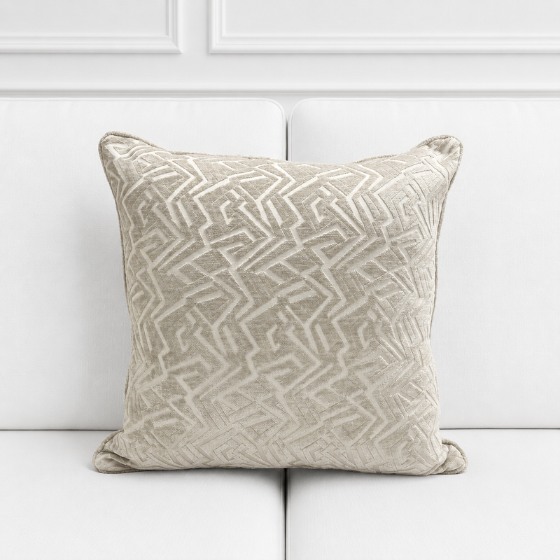 Decorative pillow with geometric pattern on a white background