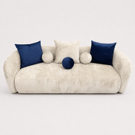 Beige sofa with blue and white cushions on a white background