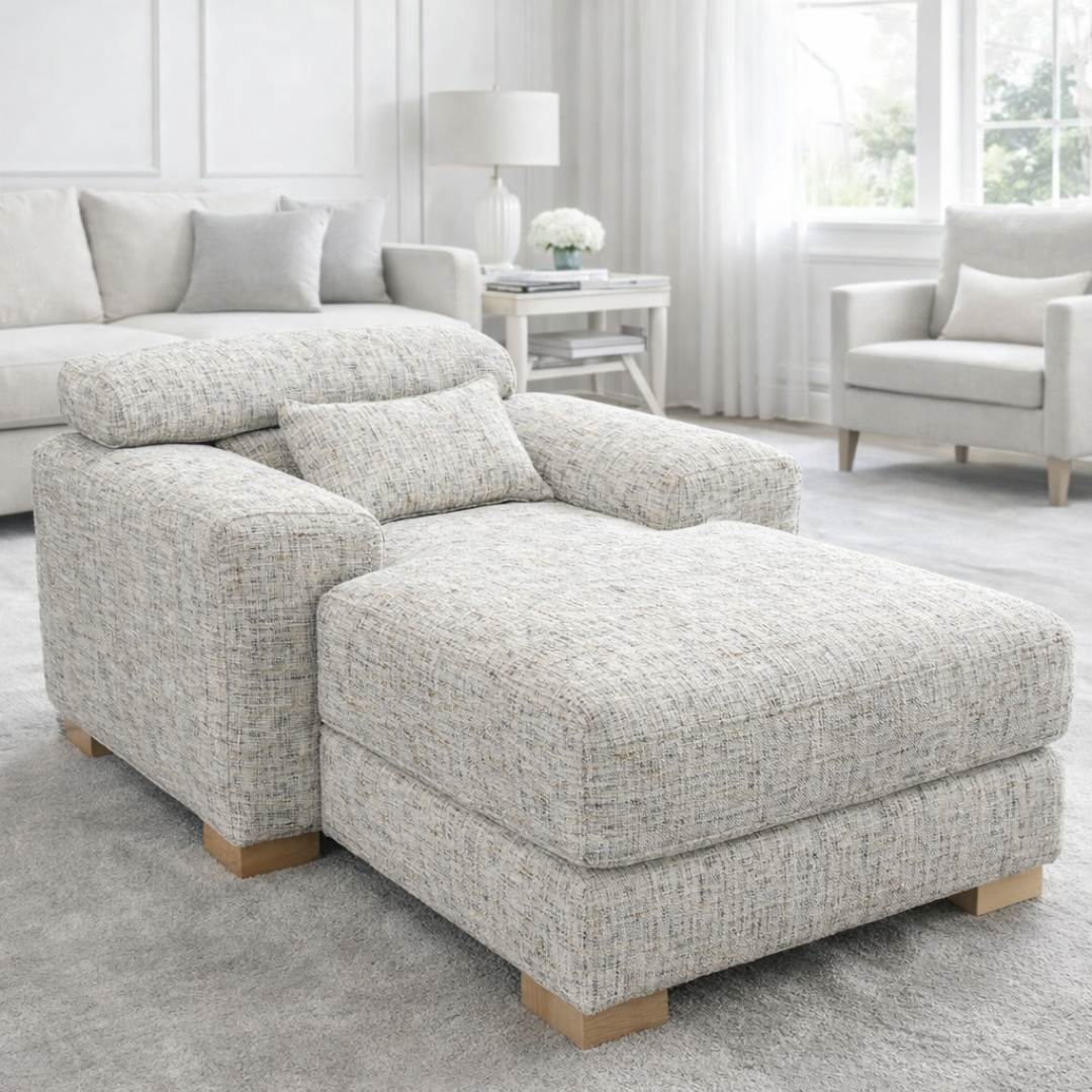 Gray textured sectional sofa in a living room setting with neutral decor.